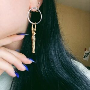 Gold plated Lady hanging on a silver plated hoop